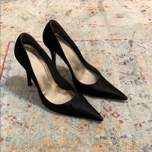 Stuart Weitzman black satin pumps